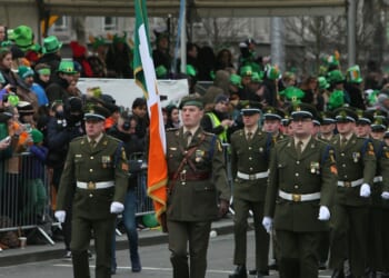 A group of Irish soldiers marching.