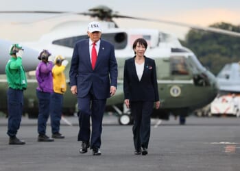 Donald Trump and Sanae Takaichi walking together.