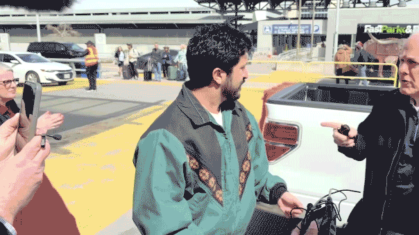 GIF of Senator Cornyn and Congressman Casar arguing at Austin airport