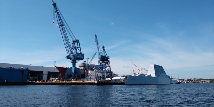 A ship docked near the Bath Iron Works shipbuilding facility in Maine.