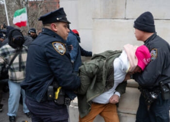 Man Pummeled by Khamenei Mourners in NYC After Snatching Poster