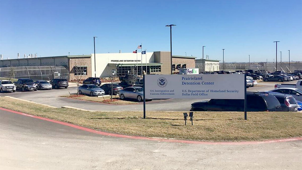 Law enforcement officers respond outside a detention facility in Alvarado, Texas, after an armed ambush.