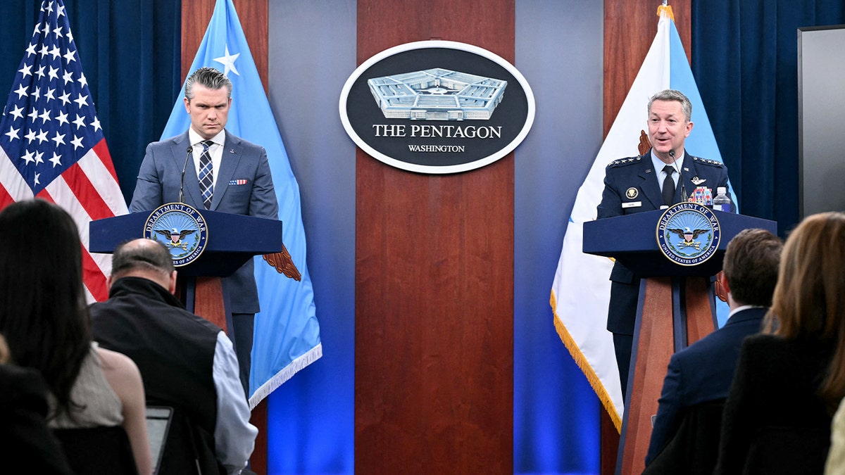 Pete Hegseth and Dan Caine speak at a Pentagon press briefing on escalating energy-related tensions.