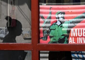 Protesters Burn Communist HQ as Trump Talks Spark Hope