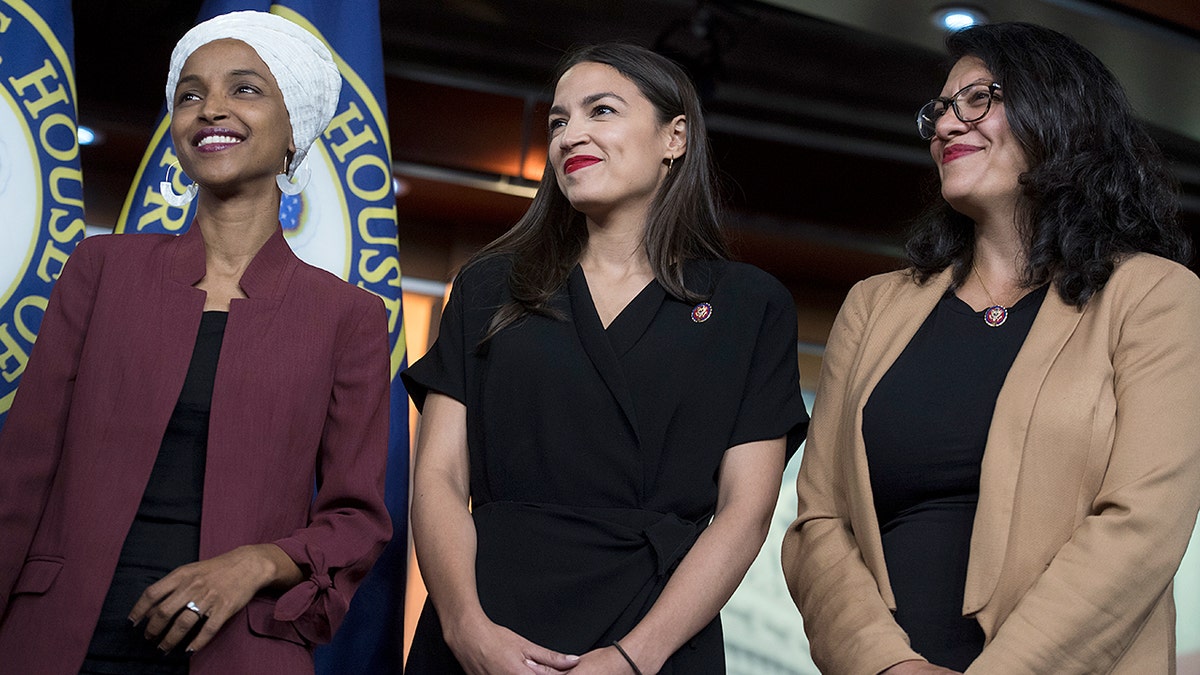 Omar, AOC and Tlaib all together smiling