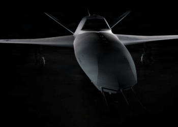 A YFQ-48 drone, shrouded in shadow.