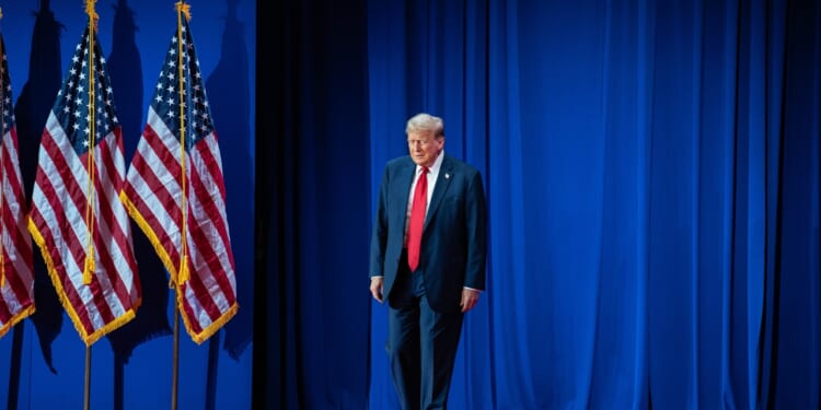 Donald Trump giving a speech in Washington, DC.