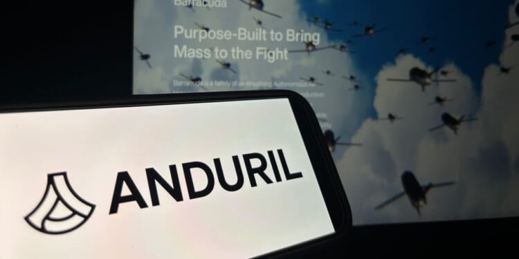 A phone displaying the Anduril logo.
