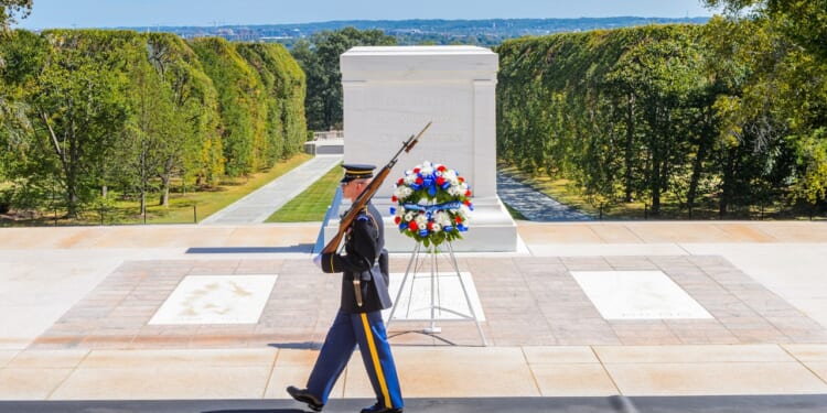 A guard patrolling in front of the Tomb of the Unknown Soldier.