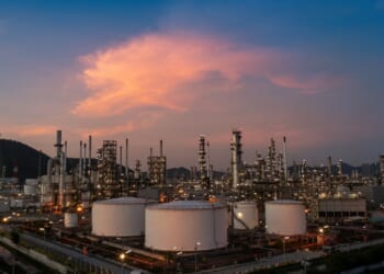 An oil refinery seen at dusk.