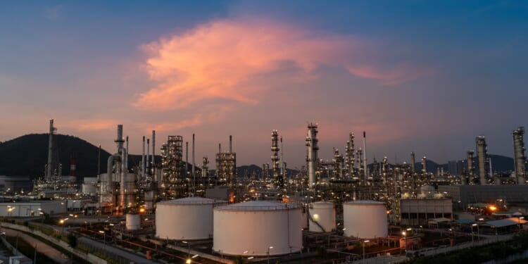 An oil refinery seen at dusk.