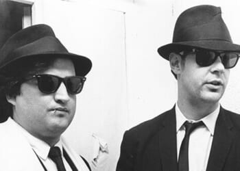 Trans Person Dressed Like a 'Blues Brother' Suspected of Murder