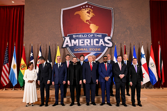 DORAL, FLORIDA - MARCH 7: U.S. President Donald Trump speaks as he hosts a gathering with heads of state or government from 12 countries from the Americas which they are calling “The Shield of the Americas Summit “ at the Trump National Doral Golf Club on March 7, 2026 in Doral, Florida. The White House describes the gathering as a landmark summit aimed at reshaping regional alliances and reinforcing U.S. influence in the Western Hemisphere. (Photo by Roberto Schmidt/Getty Images)