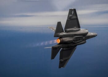 An F-35 Lightning II performing a midair turn.