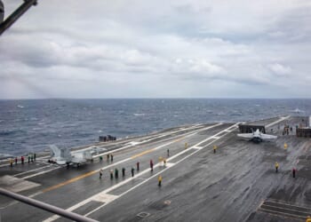 An aircraft preparing to take off from the deck of the USS Gerald R. Ford.