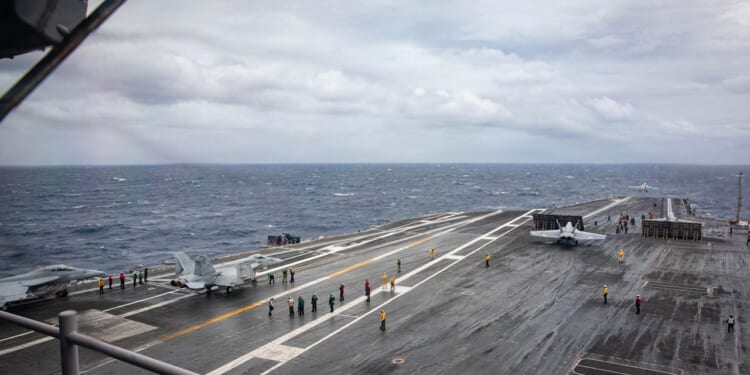 An aircraft preparing to take off from the deck of the USS Gerald R. Ford.