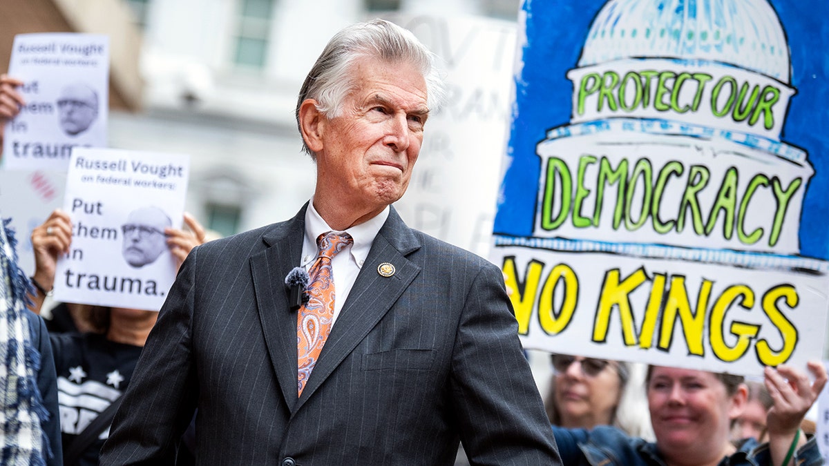 Rep. Donald Beyer Jr. standing at a protest in Washington