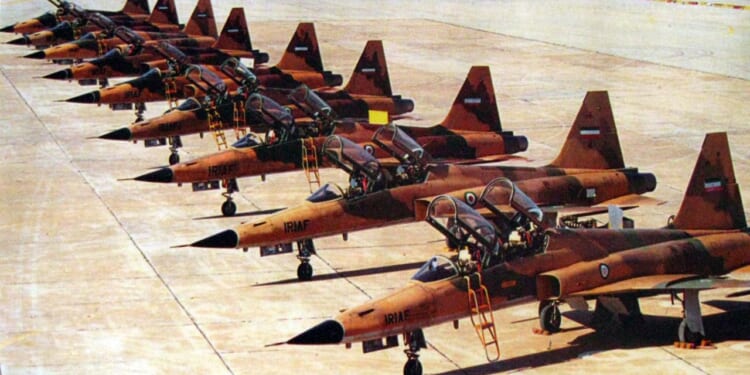 A lineup of Iranian Air Force F-5 Tigers in the desert.