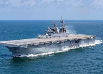The USS Tripoli amphibious assault ship sailing in the Gulf of Mexico.