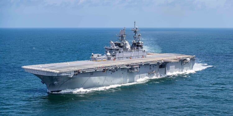 The USS Tripoli amphibious assault ship sailing in the Gulf of Mexico.