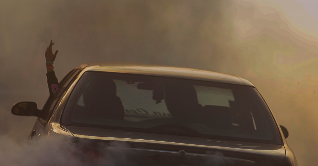 Woman Allegedly Plows into Cop in Street Takeover, Goes Free on Low Bail