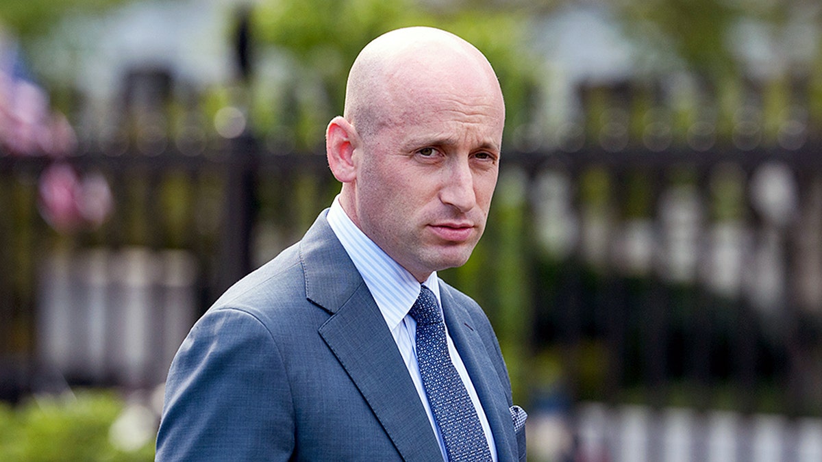 Stephen Miller standing outside the White House