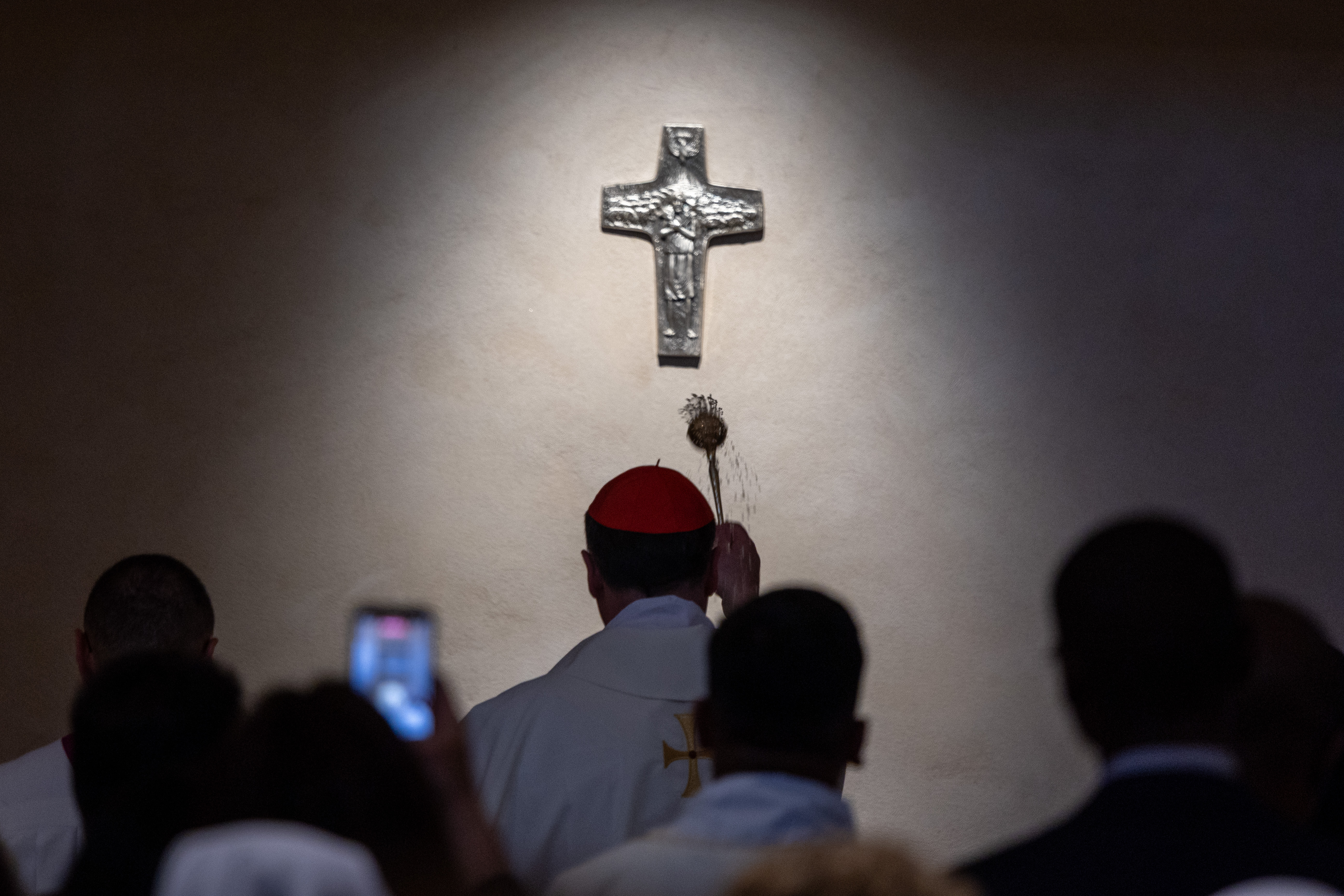 Cardinal Rolandas Makrickas, archpriest of the Basilica of St. Mary Major, sprinkles holy water on the tomb of Pope Francis at the aforementioned basilica in Rome on April 21, 2026. | Credit: Daniel Ibanez/EWTN News