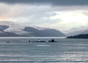 A Vanguard-class submarine sailing through icy waters.