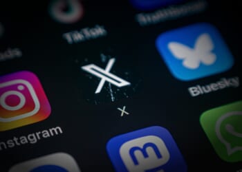 A view of a phone showing various social media apps.