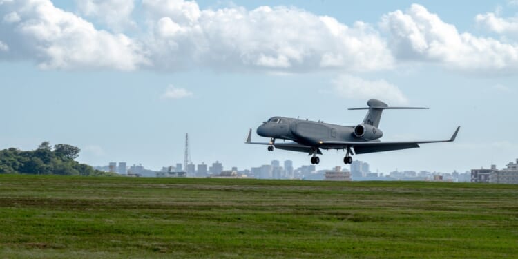 An EA-37B Compass Call aircraft on landing approach.