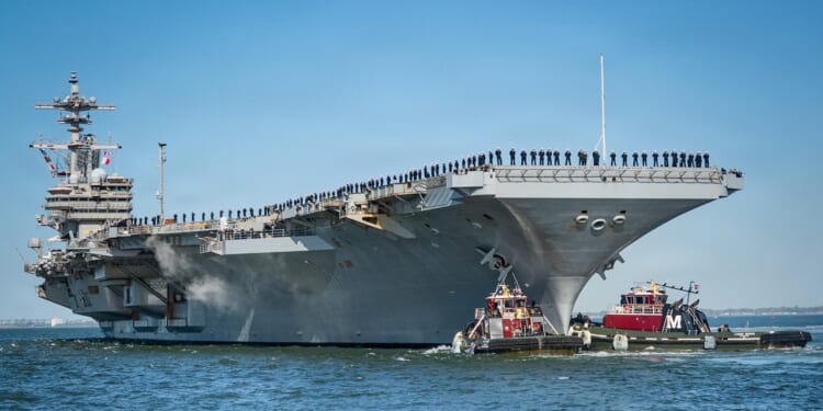The USS George H.W. Bush leaving its homeport on Tuesday, March 31.