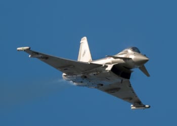A British Eurofighter Typhoon fighter jet in flight.