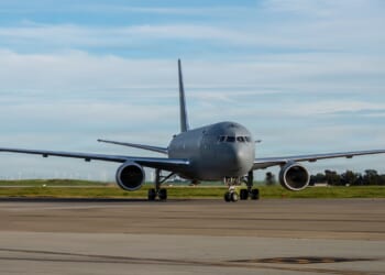 A KC-46 Pegasus tanker aircraft on a runway.