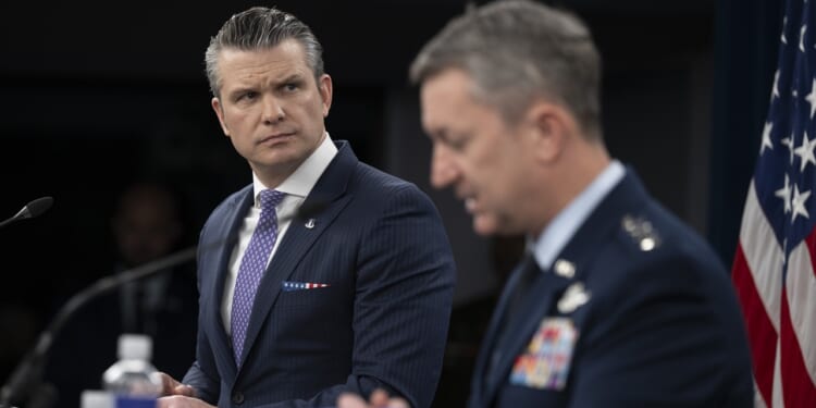 Pete Hegseth addresses reporters at the Pentagon.