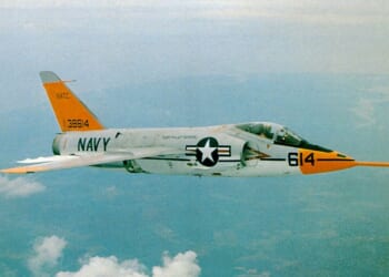 An F-11 Tiger aircraft in flight.
