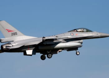 A Royal Norwegian Air Force F-16 Fighting Falcon fighter jet in flight.