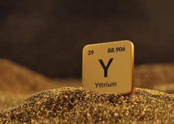 The element yttrium is placed on top of mineral sands.