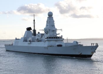 A Type 45 destroyer returning to port on a calm day.