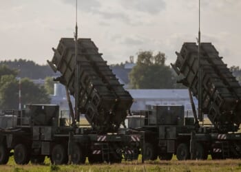 Two Patriot missile batteries on display.