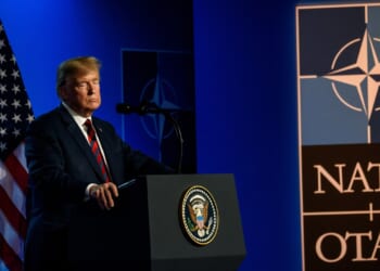 President Donald Trump delivers a speech at NATO headquarters.