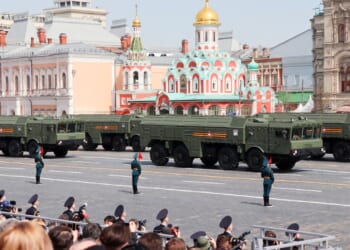 A parade of Russian missile trucks passes through Red Square.