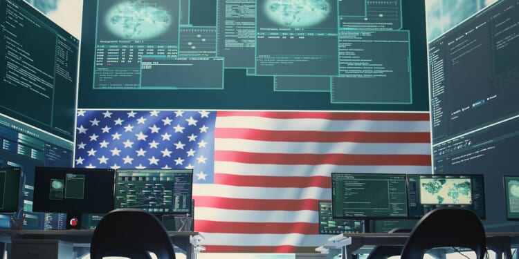 A high-tech US cyber operations center displays threat monitoring against a backdrop of the American flag.