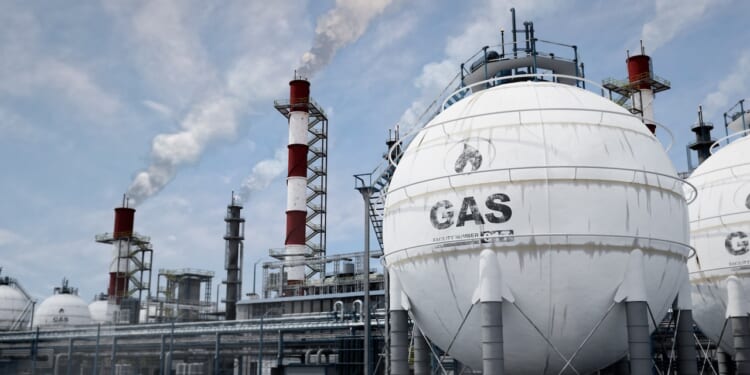 LNG storage tanks at a processing or refinery plant.